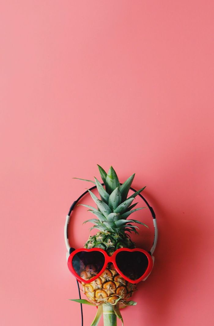 Pineapple on colored background