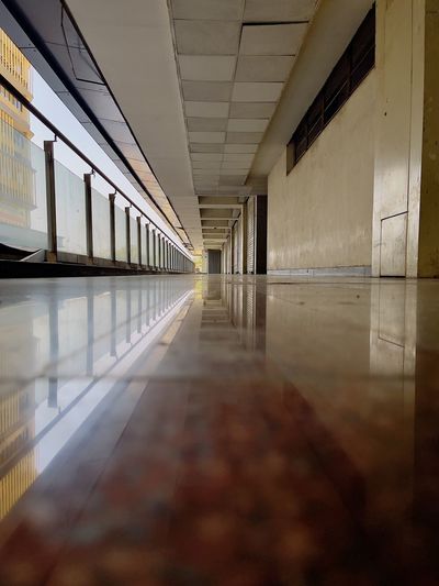 Surface level of empty corridor of building