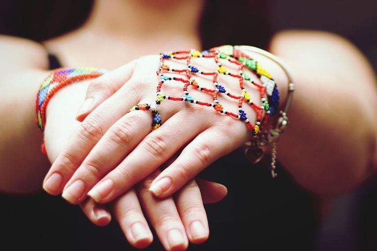 Close-up of multi colored hands