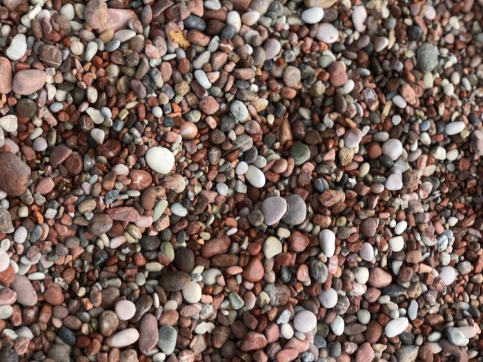 Full frame shot of pebbles at beach