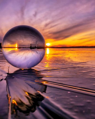 Reflection of sky on sea during sunset