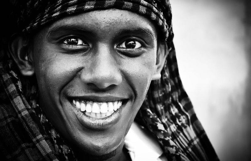 Close-up portrait of a smiling young man