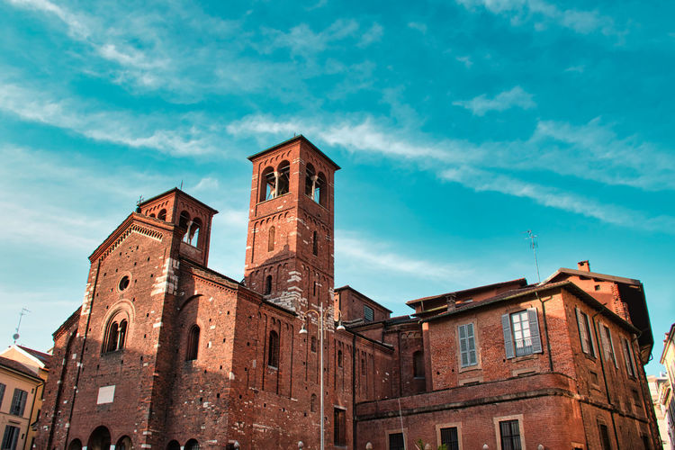 Chiesa di san sepolcro church in milan, italy with bright blue sky