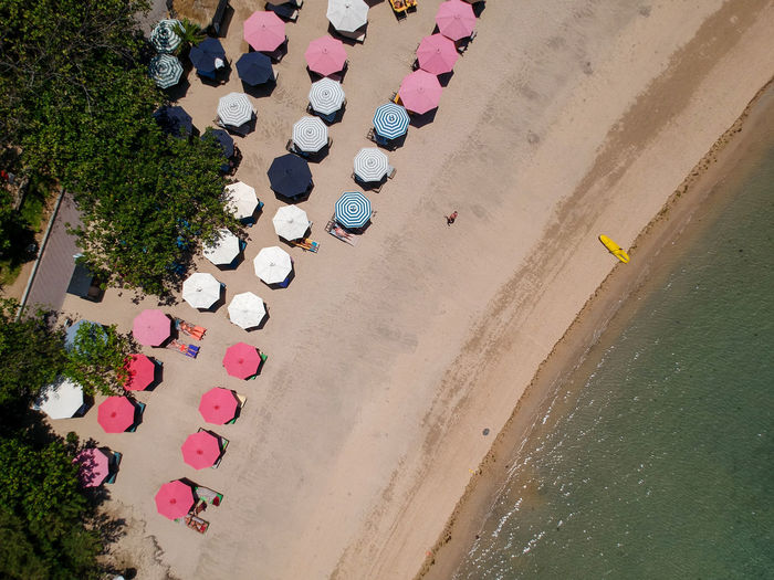 High angle view of multi colored umbrellas on beach