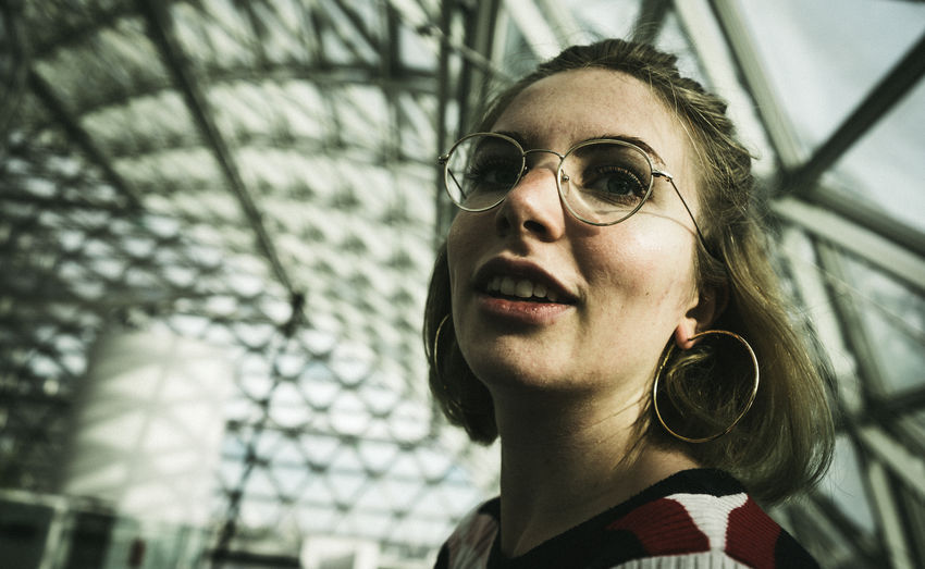 Portrait of smiling woman wearing sunglasses
