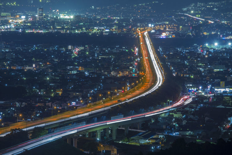 High angle view of illuminated highway during night
