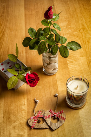 High angle view of roses in vase on table