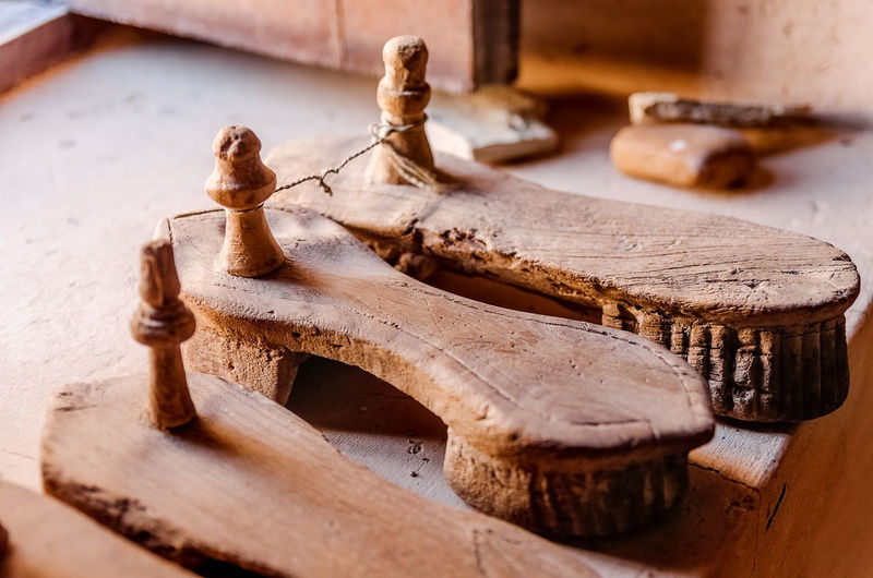 Close-up of old sculpture on table