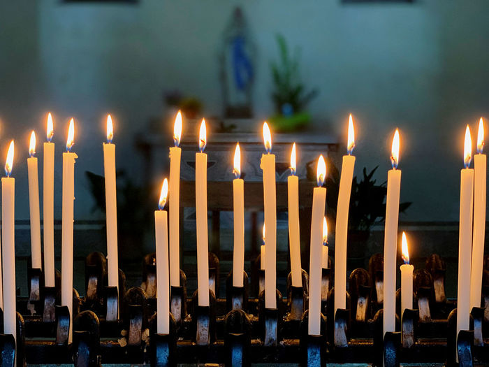 Candles burning in church