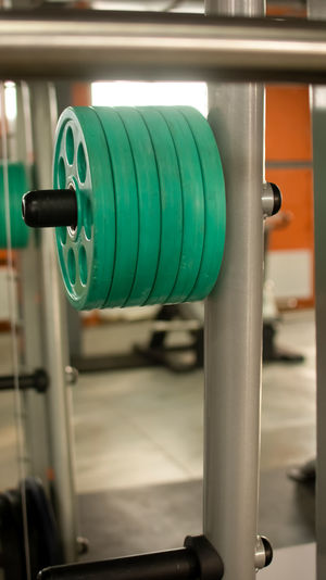 Close-up of dumbbells in gym
