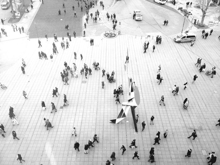 High angle view of people walking at pedestrian zone