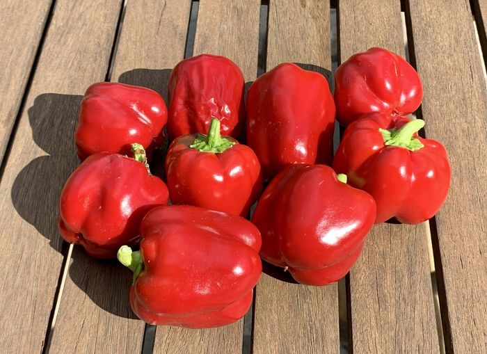 High angle view of red bell peppers on table