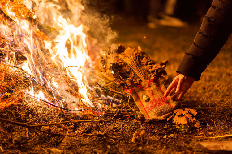 Hand holding bonfire