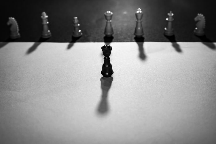 High angle view of chess pieces on table