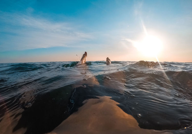 Sunset swimming in first person view