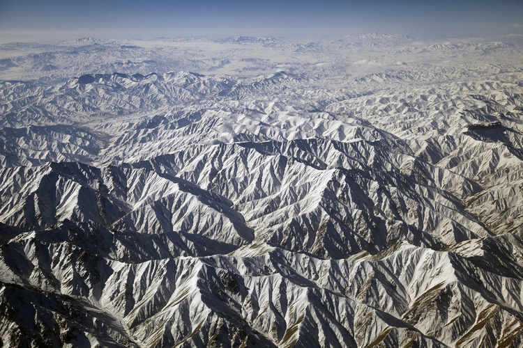 Rugged landscape of hindukush in winter season photographed from airplane