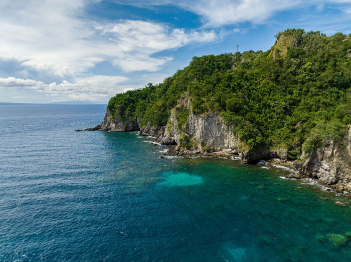 Rocky coast of a tropical island. apo island. negros, philippines.