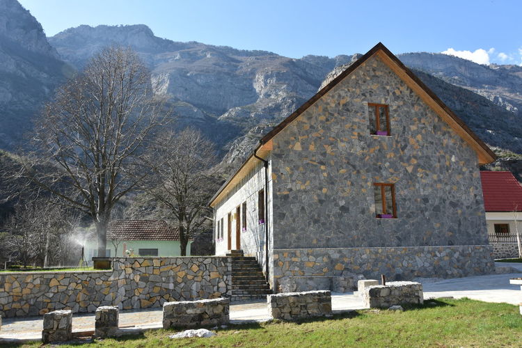 View of buildings against mountain