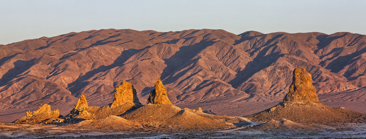 Scenic view of rock formation at desert against sky