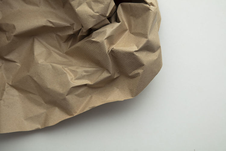 Close-up of crumpled paper on white background