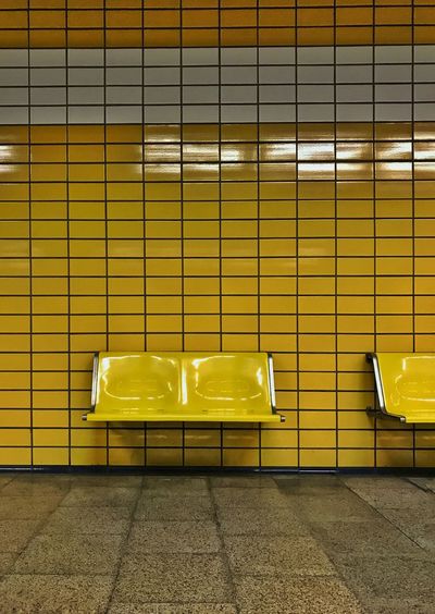 Empty seats in a subway station