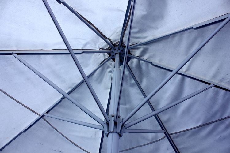 Low angle view of open umbrella 