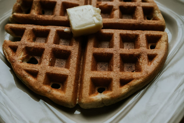 High angle view of a waffle with butter