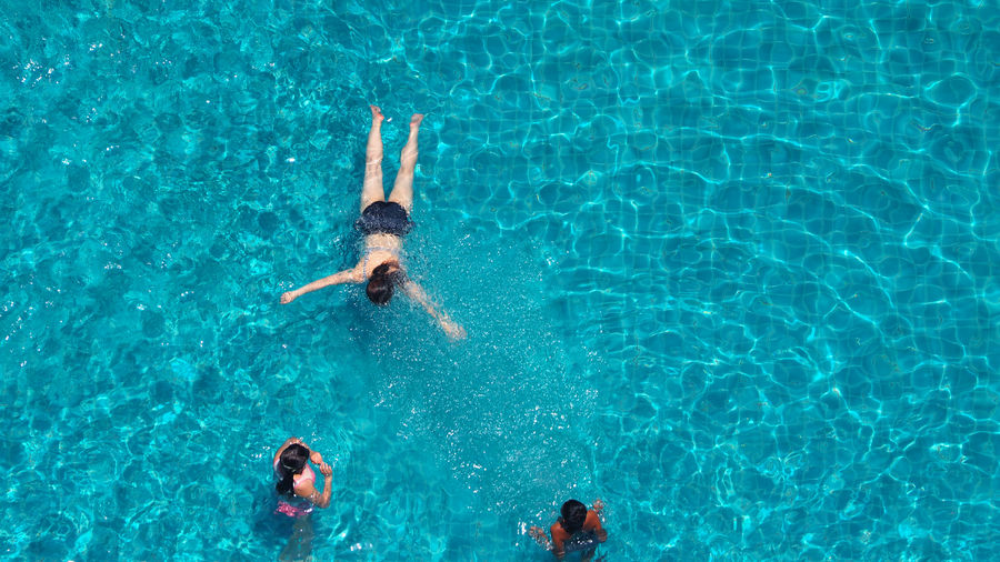 People swimming in pool