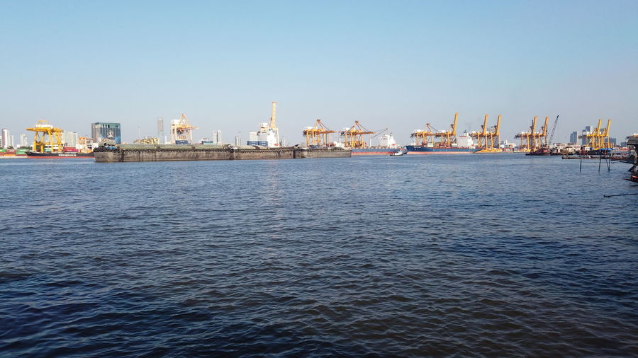 View of commercial dock against clear sky