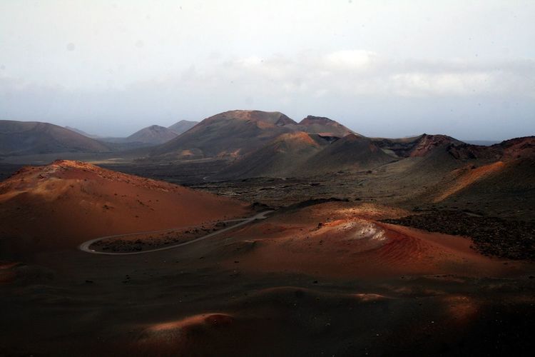 Scenic view of volcanic landscape at timanfaya national park