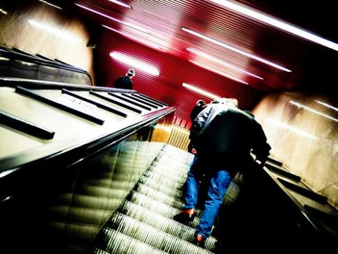 Low angle view of man standing on subway station