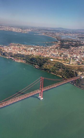 Aerial view of april 25th bridge over tagus river