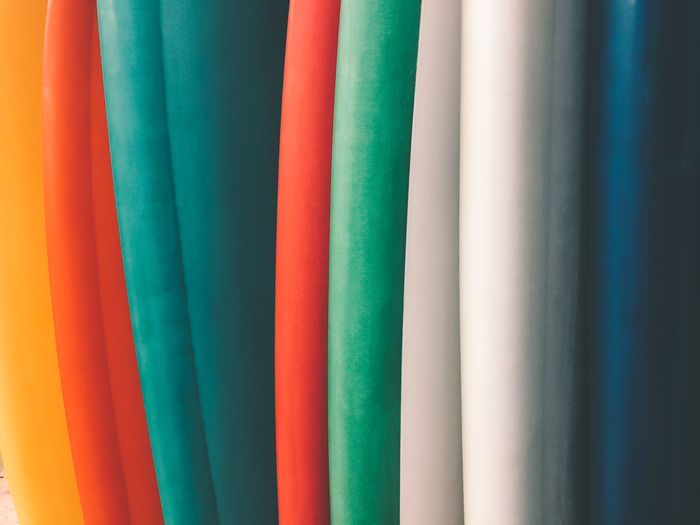 Full frame shot of multi colored surfboards 