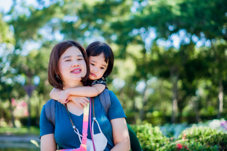 Portrait of happy mother and daughter