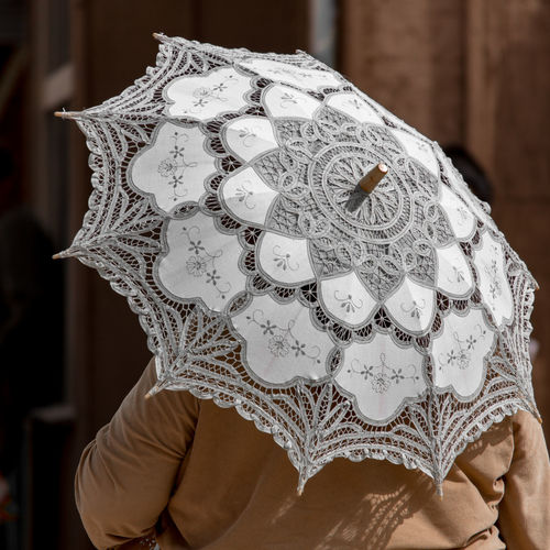 Cropped image of person with umbrella