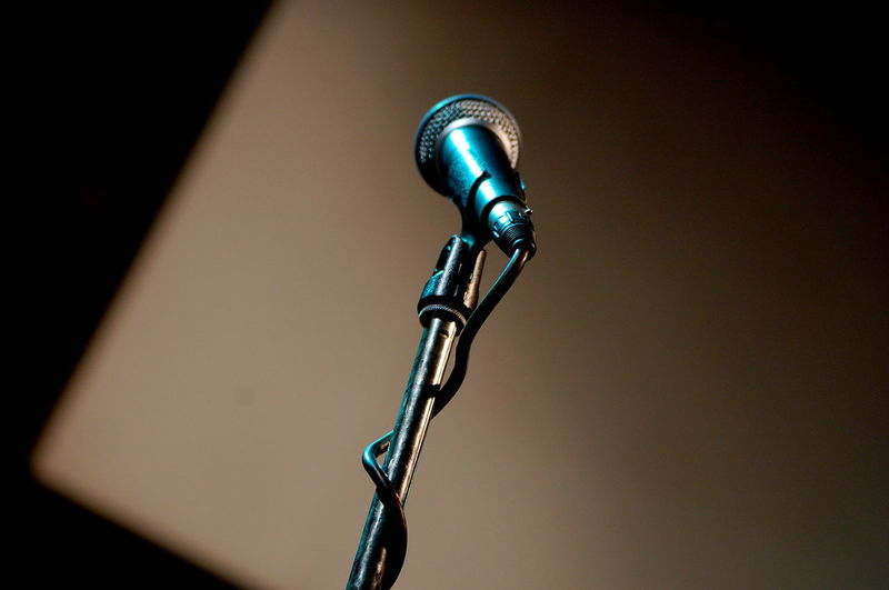 Close-up of shiny microphone on stand