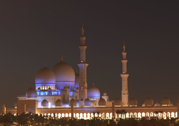 Illuminated mosque at night