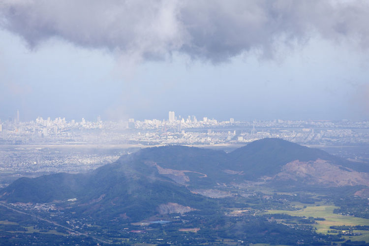 Aerial view of townscape against sky