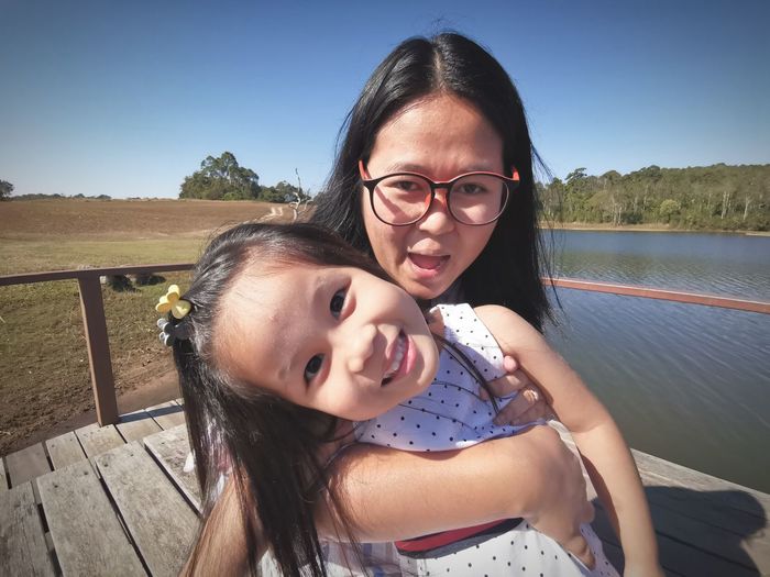Portrait of happy mother and daughter
