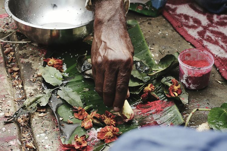 Close-up of man performing ritual