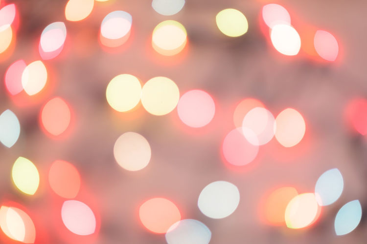 Defocused image of illuminated lights at night