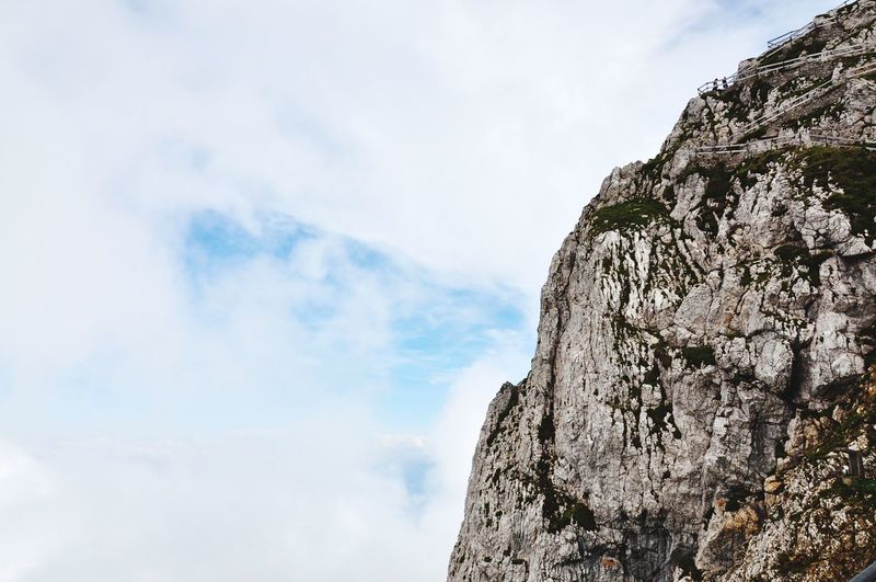 Low angle view of rock formation against sky in pilatus.