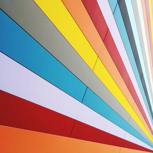 Low angle view of multi colored paper