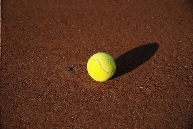 Close-up of yellow tennis ball