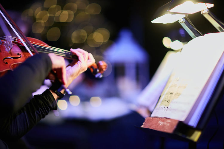 Cropped image of musician playing violin