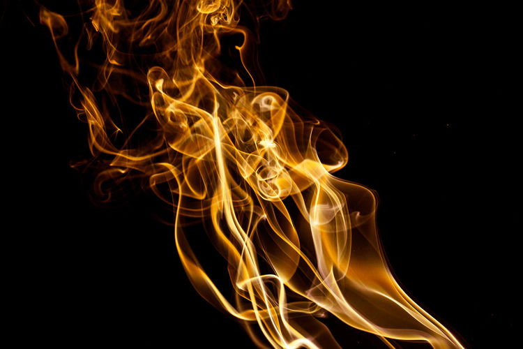 Close-up of fire against black background