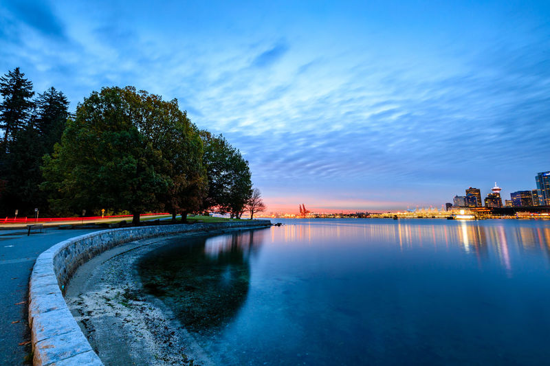 Light trail along vancouver seawall during october sunrise