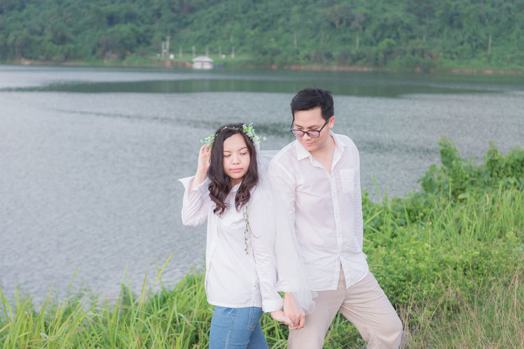 Young couple standing on land