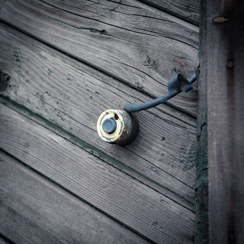Directly above shot of wooden door handle