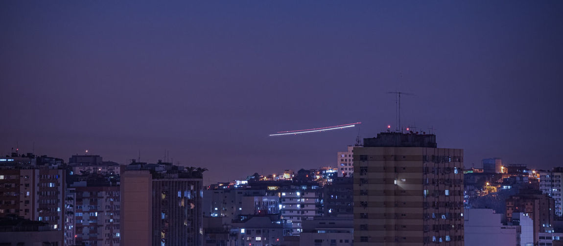 Long exposure urban night photography with buildings and lights in rio de janeiro, brazil